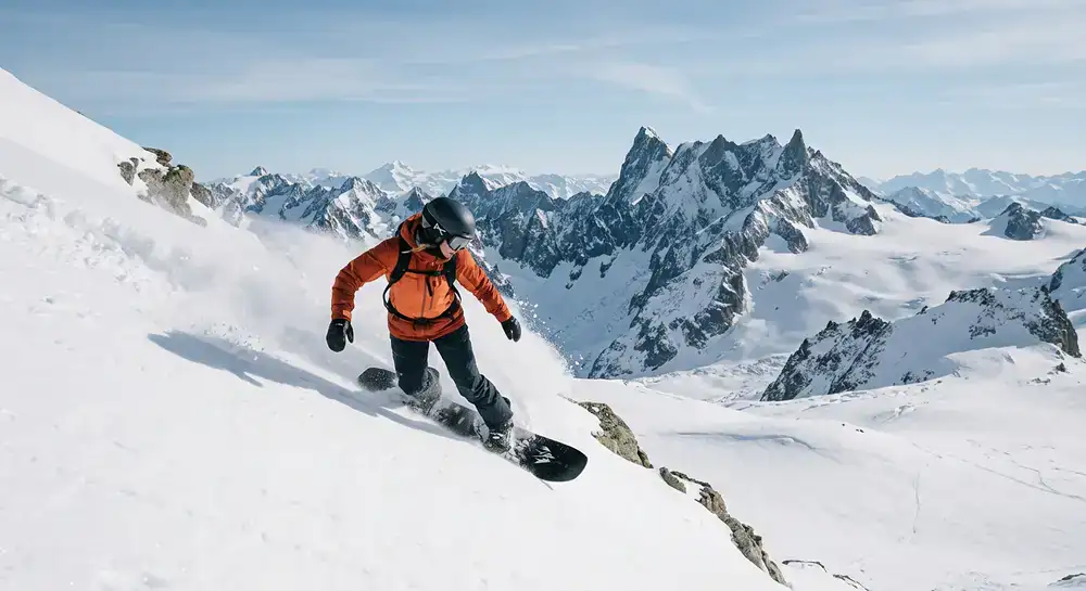 Freeride snowboard against a winter backdrop